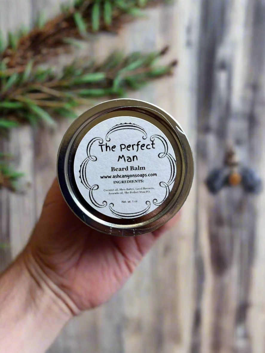 Jar of 'The Perfect Man' beard balm on a wooden bathroom counter